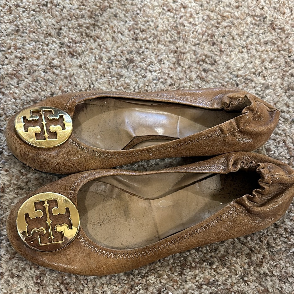 Tory Burch Used flats wear and tear but could still be used!
